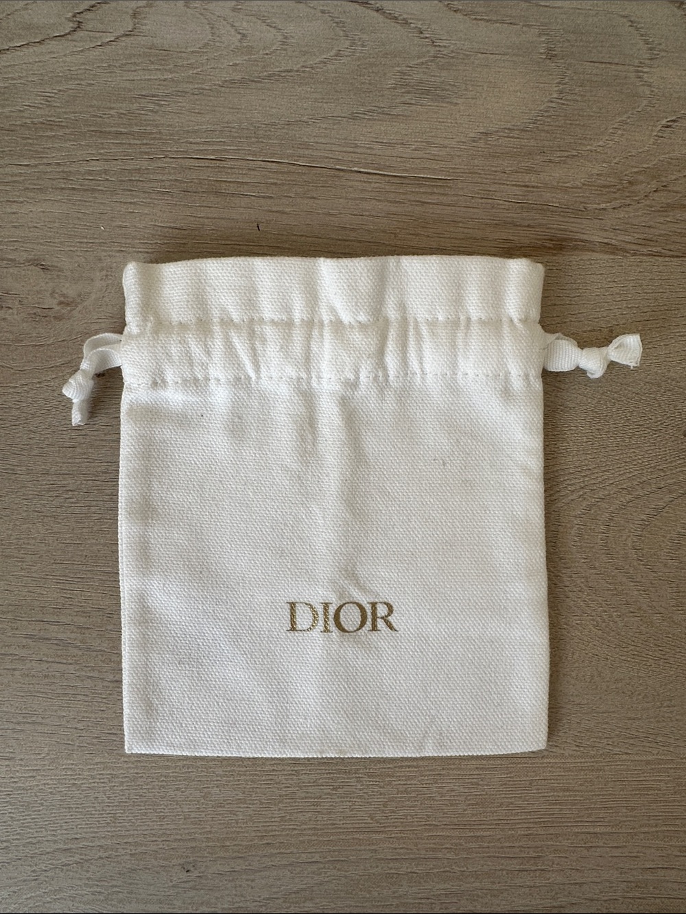 Dior White Drawstring Pouch with Gold Logo